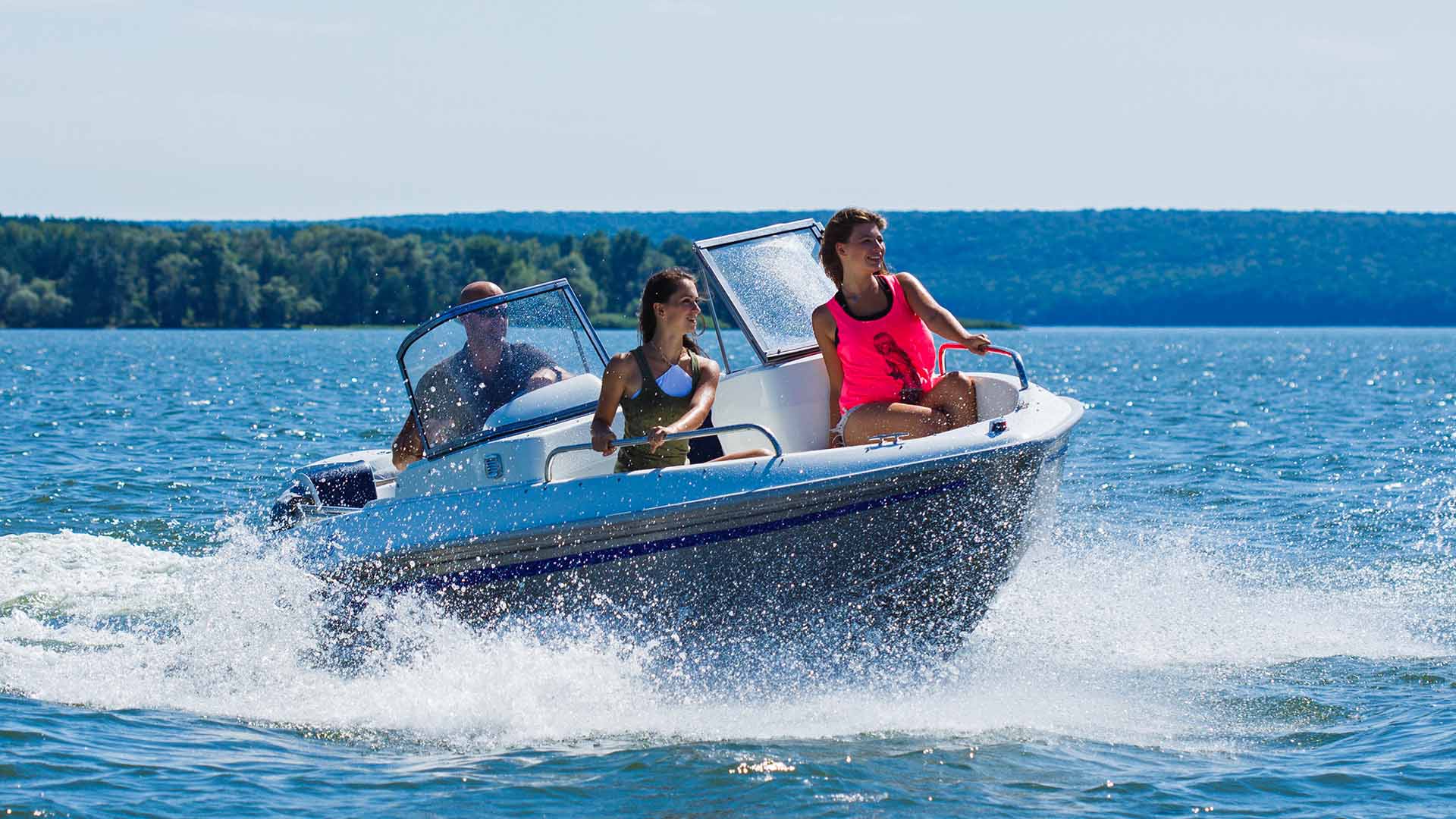 Woman enjoying summer day on boat