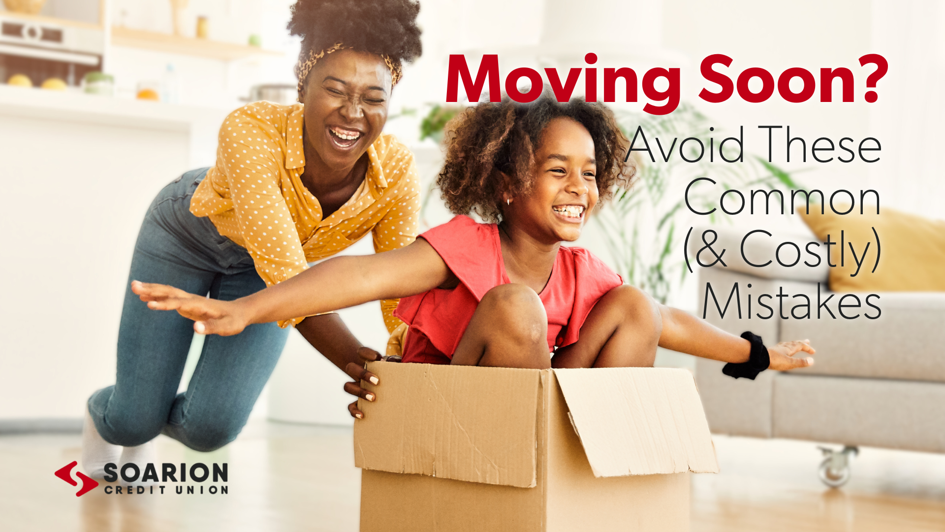 Woman pushes little girl in moving box